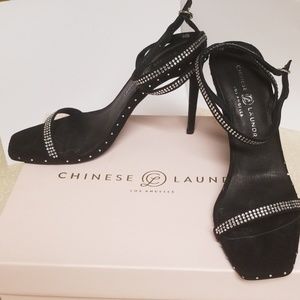 Heeled black Chinese Laundry sandals.